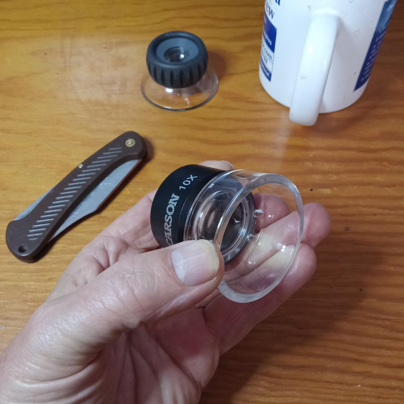 Carson LumiLoupe 10X Power Black/Clear Stand Magnifier, Ambient Light, 1.0 inch Lens Diameter, 2.0 inch Base Diameter (LL-10) customer photo 1