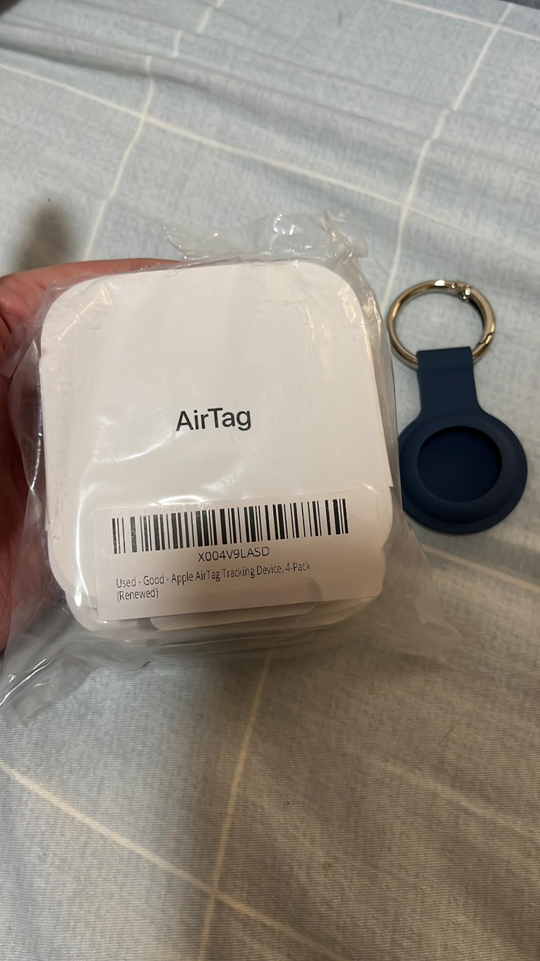 Apple AirTag Tracking Device, 4-Pack (Renewed) customer photo 1